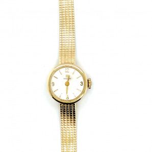 Złoty zegarek Tissot...