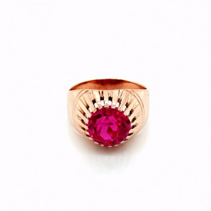 Złoty pierścionek z różowym...